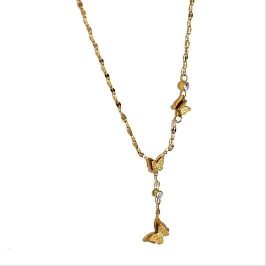 Gold antiternish necklace with butterfly pendants on a white background
