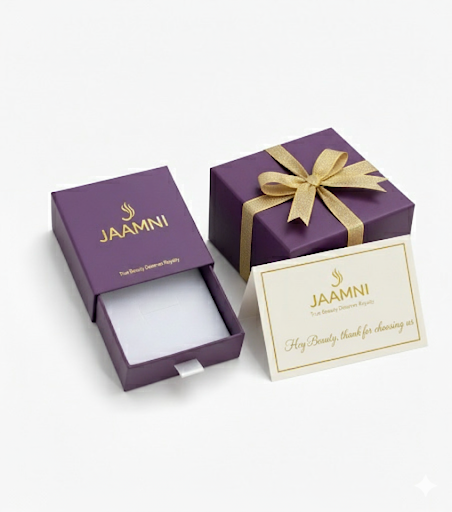 Purple gift box with gold bow and 'Jaamni' branding on a white background